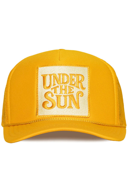 Bright yellow retro trucker hat featuring an embroidered "Under The Sun" patch with breathable mesh back and adjustable snapback design.