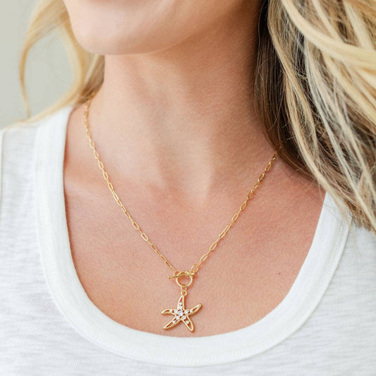 Collier à bascule Étoile de mer dorée | Collier pendentif plage côtière | Bijoux étoile de mer CZ chaîne trombone | Collier ras du cou plaqué or 18 carats