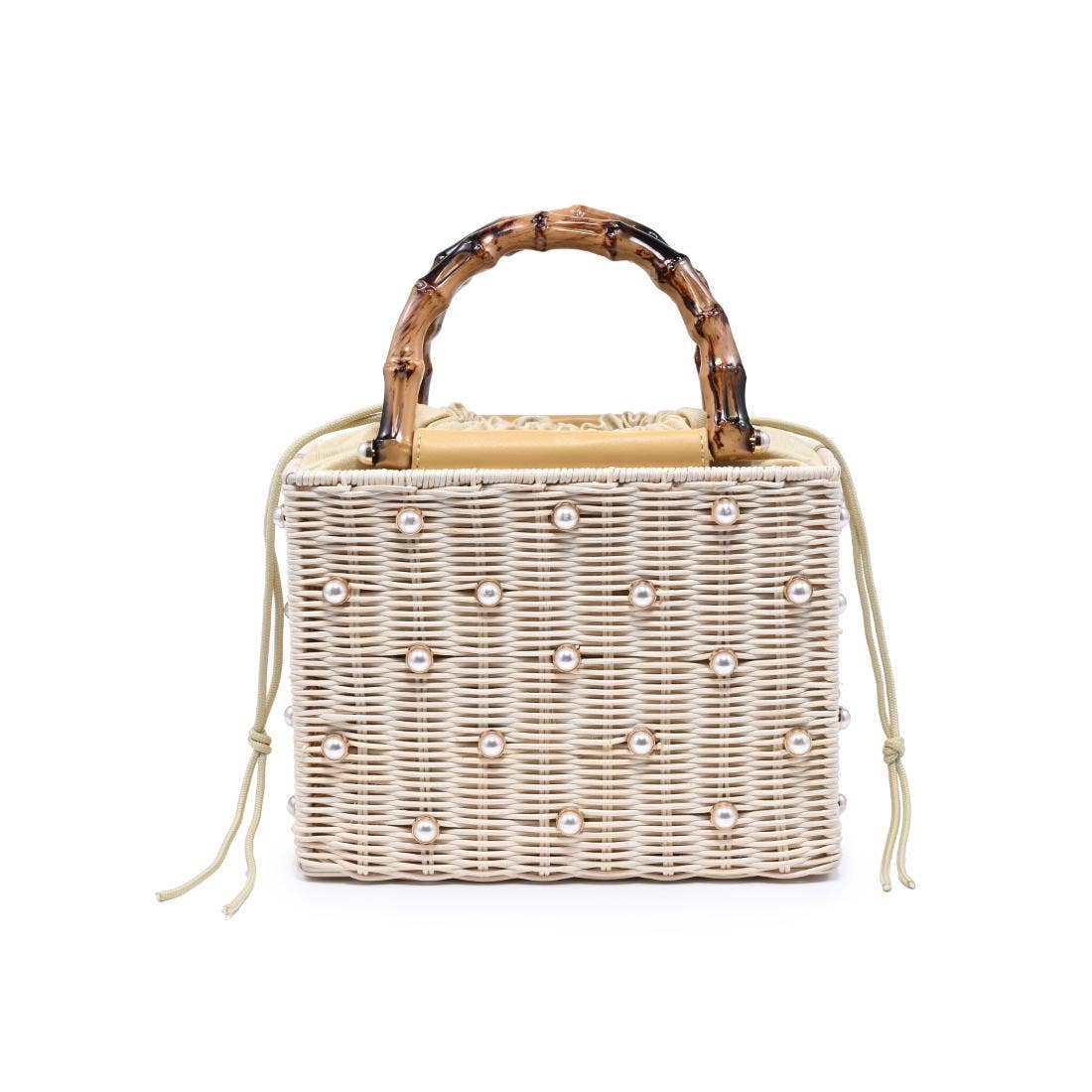 Wicker handbag with bamboo handle and pearl embellishments on a white background