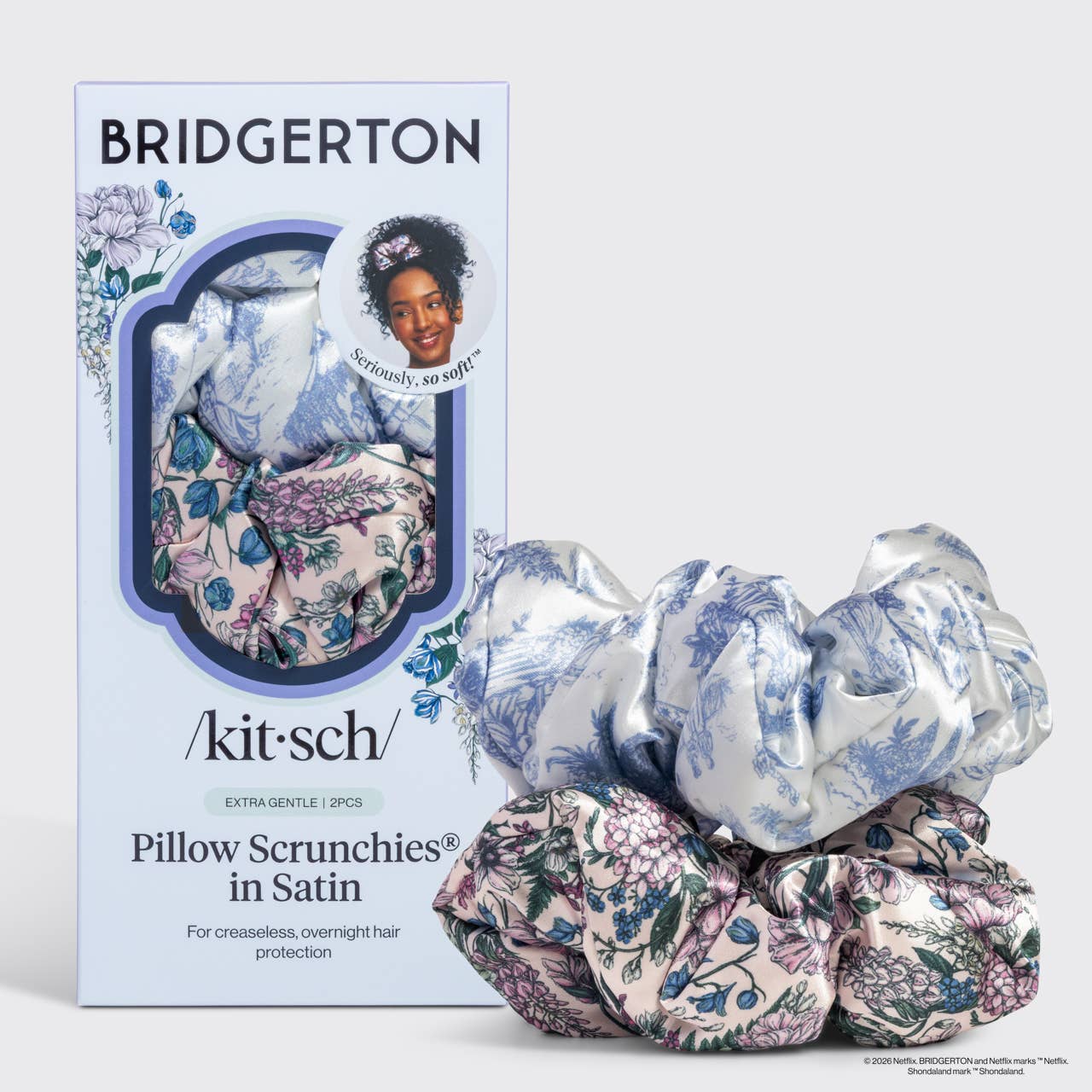 Bridgerton pillow scrunchies packaging with scrunchies in front on a white background