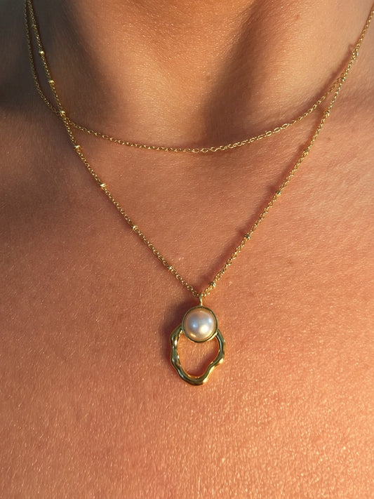 The Petite Pearl Standard- Chain Layered Pearl Stud Oval Pendant Necklace