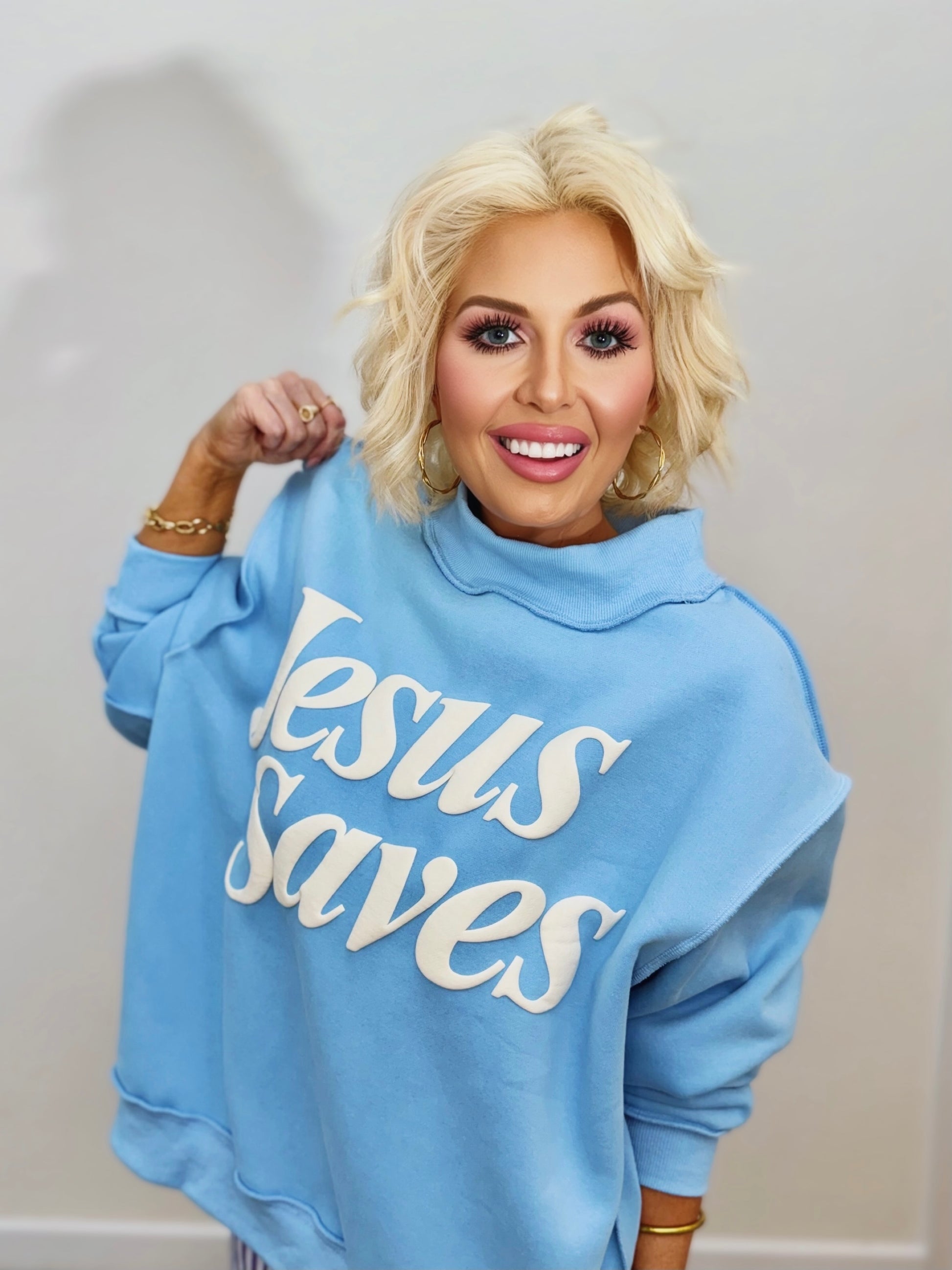 sky blue Jesus Saves oversized mock neck Christian sweatshirt with puff print graphic