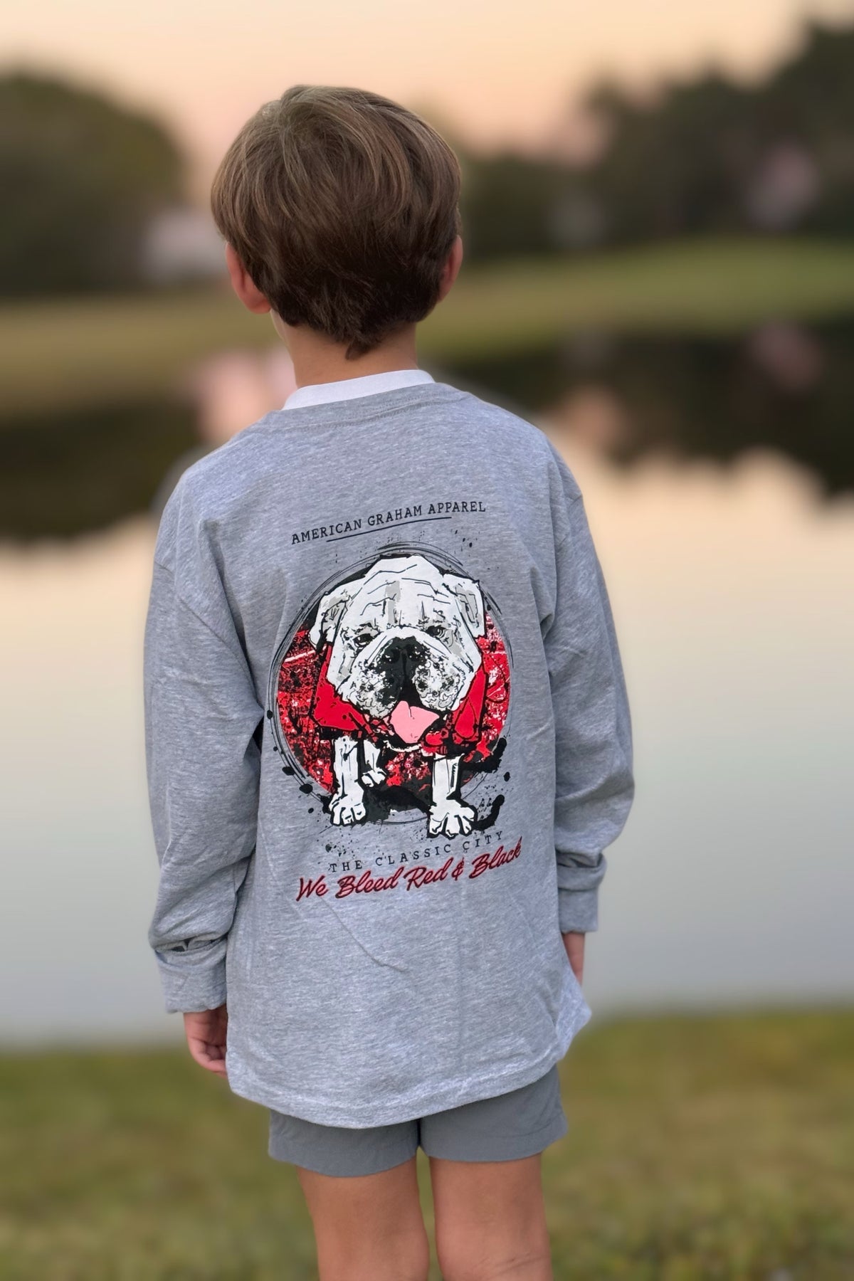 We Bleed Red & Black Youth Bella+Canvas® Long Sleeve Graphic Tee