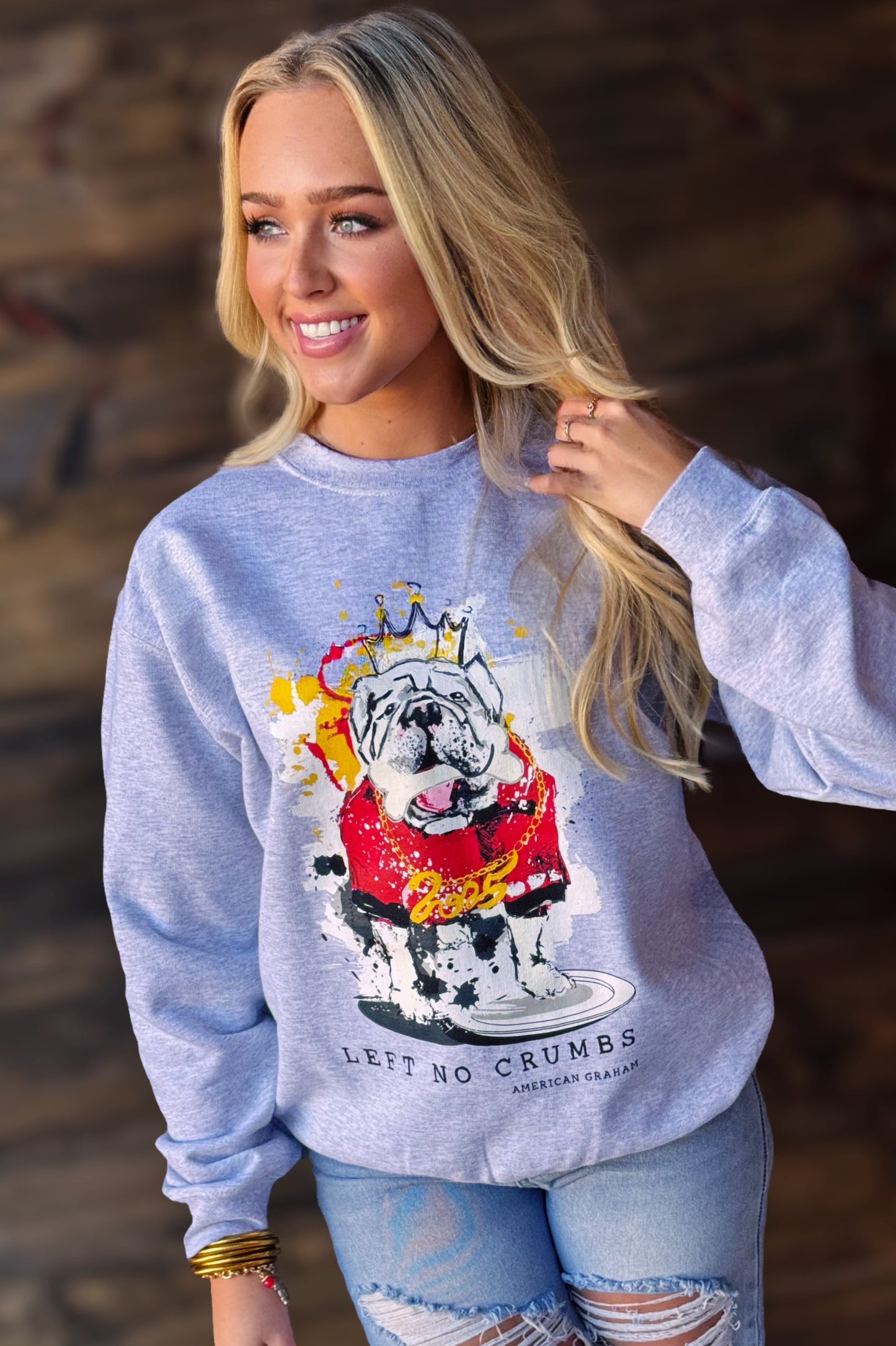 AMERICAN GRAHAM- SEC CHAMPIONSHIP SWEATSHIRT WITH BULLDOG IN RED JERSEY PAINTED BY ASHLEY GRAHAM