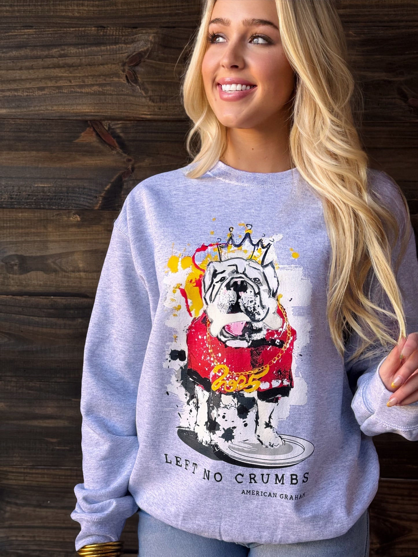 AMERICAN GRAHAM- SEC CHAMPIONSHIP SWEATSHIRT WITH BULLDOG IN RED JERSEY PAINTED BY ASHLEY GRAHAM