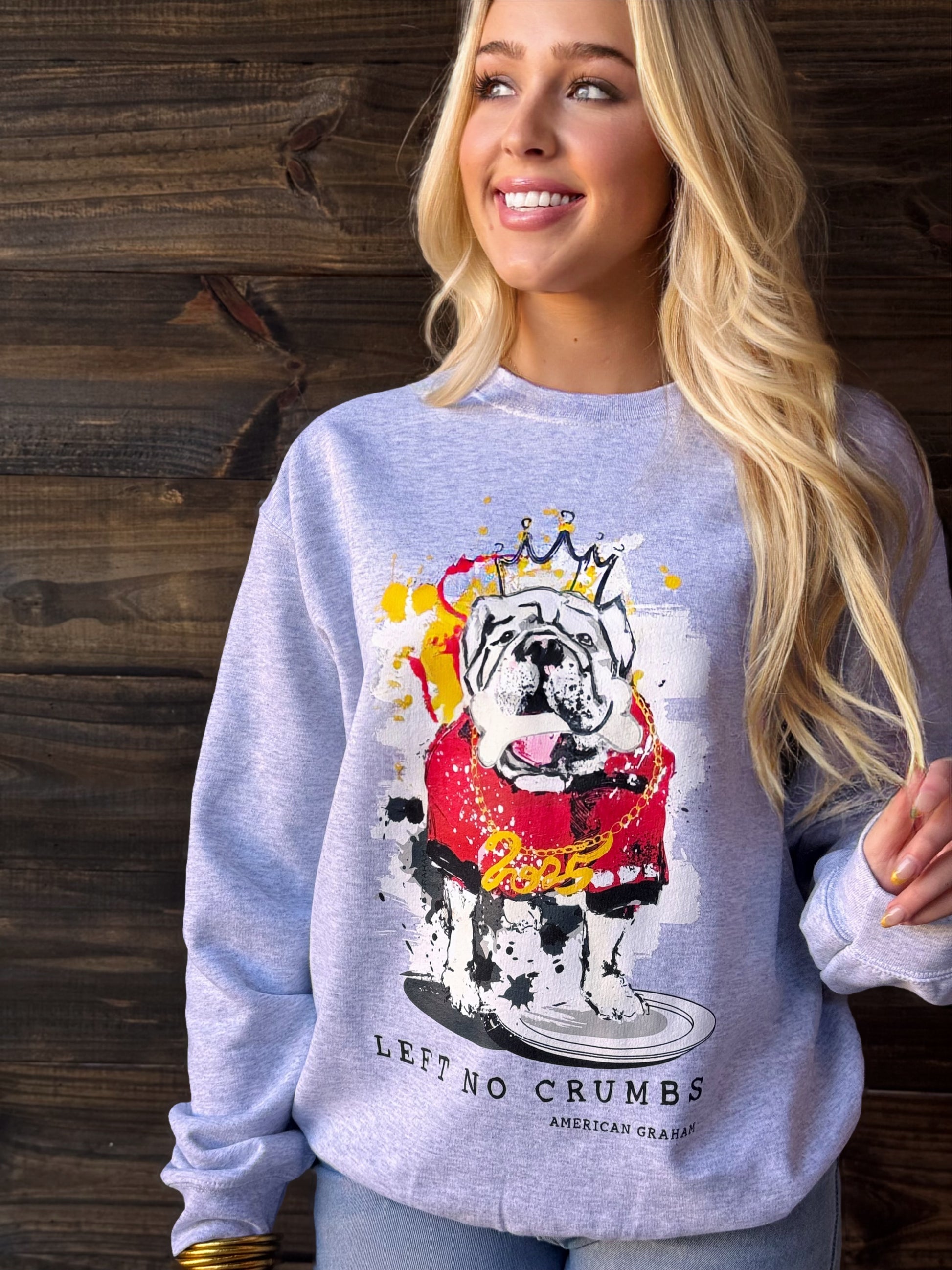 AMERICAN GRAHAM- SEC CHAMPIONSHIP SWEATSHIRT WITH BULLDOG IN RED JERSEY PAINTED BY ASHLEY GRAHAM