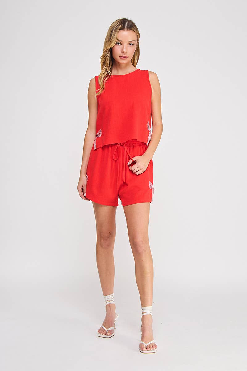 Zweiteiliges Shorts-Set mit rot karierter Schleife