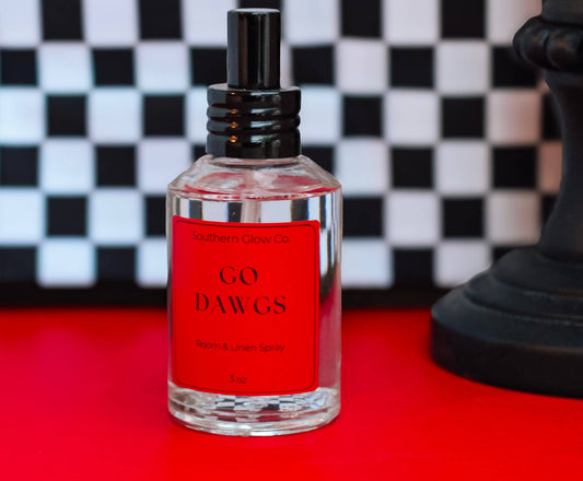Celebrate game day with Go Dawgs Room & Linen Spray, featuring crisp red apple, warm cedar and creamy vanilla for a cozy fall fragrance.